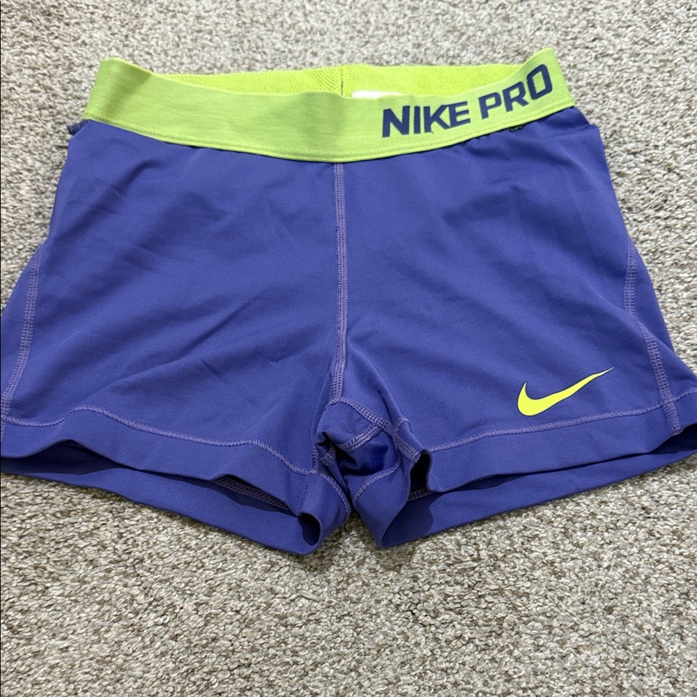 Nike Pro Blue Shorts with Green Waistband
